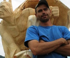 The Bark Knight Saw Sculpture Brings Fame to This Woodworker