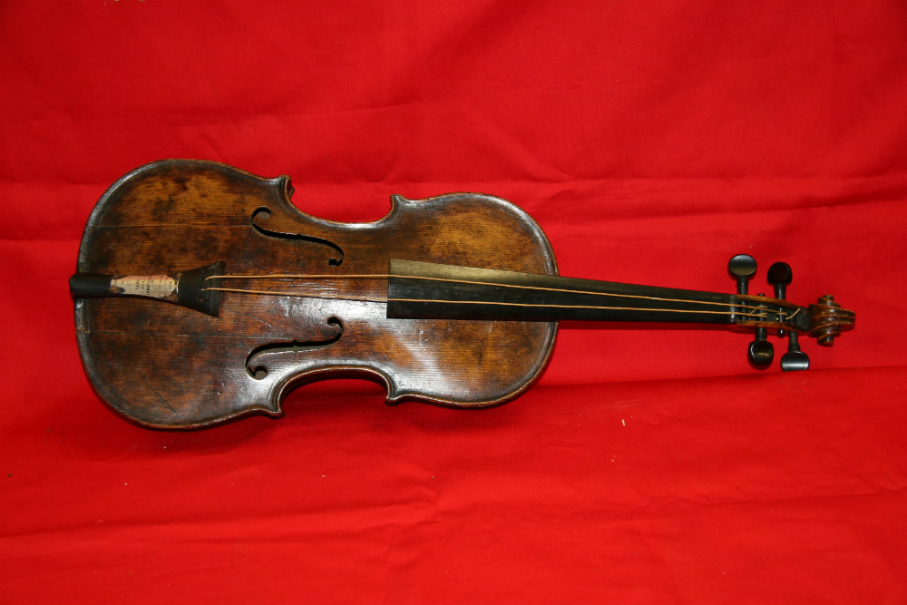 Wood Violin Played by Titanic Band Leader Sold for $1.4M