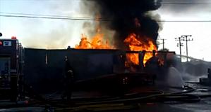 Fire destroys sawmill warehouses